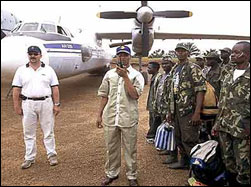 Victor Bout standing near airplane