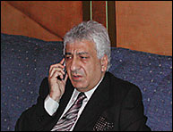 Photo of Kassar on cell phone