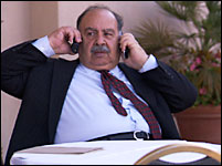 Sarkis Soghanalian on two cell phones